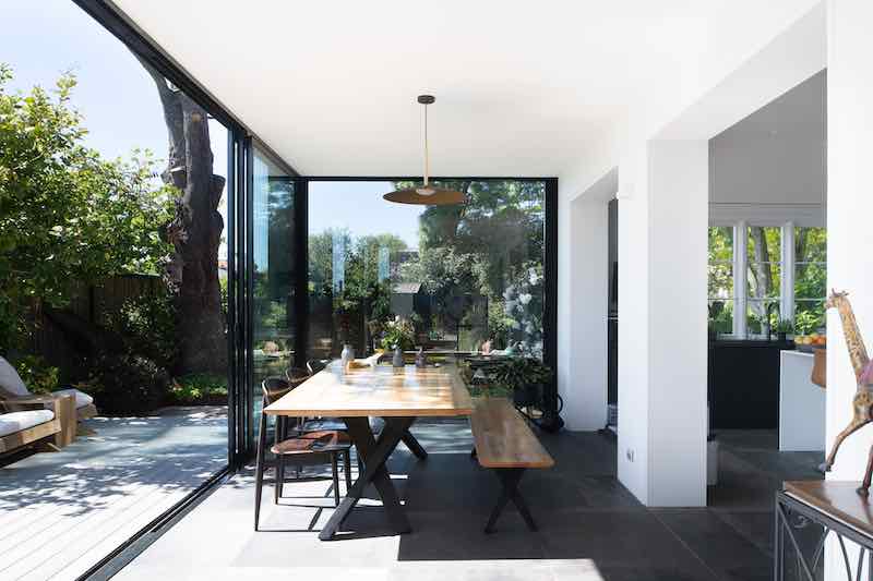 Internal view of dining room looking out over water feature